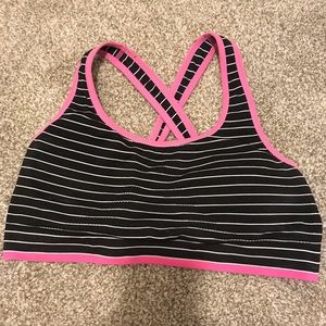 Black and white striped sports bra with pink